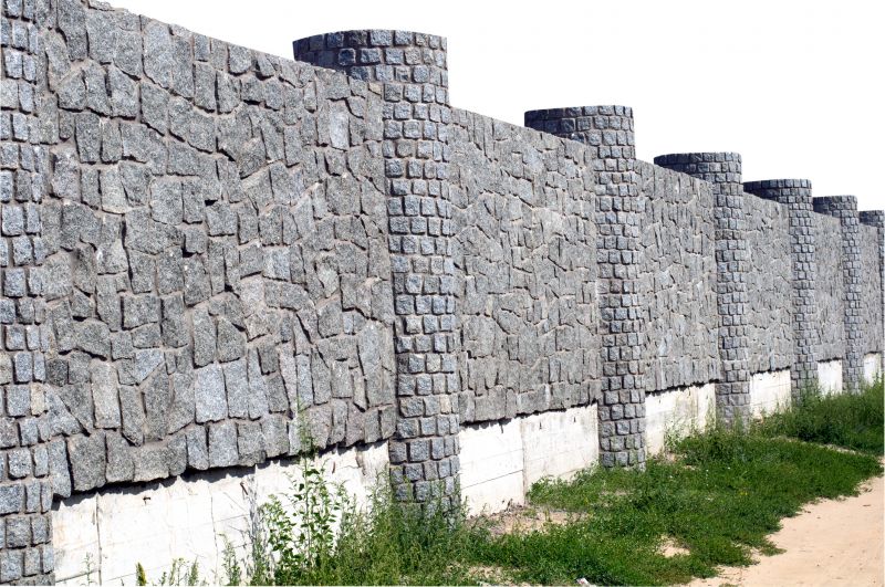 Masonry Installation of a Stone Wall